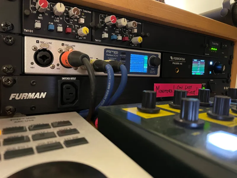 Dom Storrs working at his audio workstation