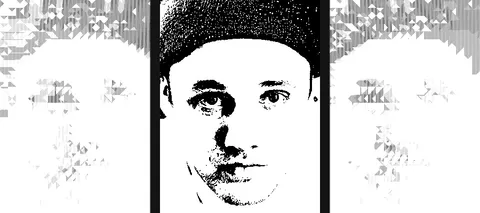 A close up of Dom Storrs' face in black and white.